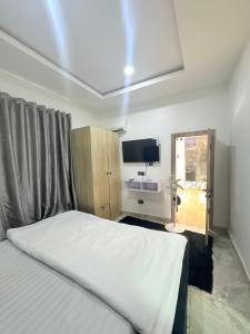 Ένα ή περισσότερα κρεβάτια σε δωμάτιο στο Candy home