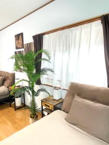 Χώρος καθιστικού στο Chatan Beach House 2