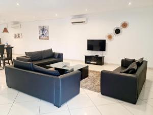 Μια τηλεόραση ή/και κέντρο ψυχαγωγίας στο Lizzy Private Rooms