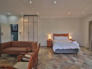 Ένα ή περισσότερα κρεβάτια σε δωμάτιο στο Aintree Lodge