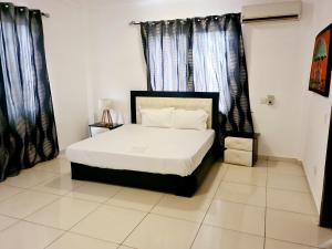 Ένα ή περισσότερα κρεβάτια σε δωμάτιο στο Lizzy Private Rooms