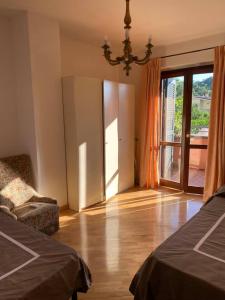 Ένα ή περισσότερα κρεβάτια σε δωμάτιο στο Monterosi Guest House & Golf