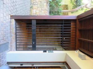 a room with a large window with metal bars at Table Mountain Villa in Cape Town +16 photos