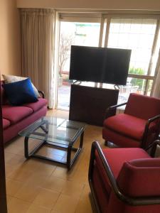 TV a/nebo společenská místnost v ubytování Casa Hanami, habitación doble excelente ubicación