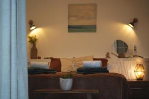 Ένα ή περισσότερα κρεβάτια σε δωμάτιο στο Porta d'Irta