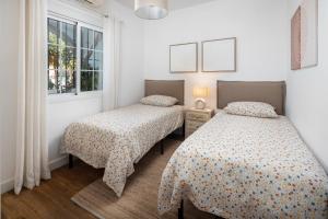 Ένα ή περισσότερα κρεβάτια σε δωμάτιο στο Casa ìtaca +17 φωτογραφίες
