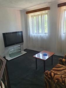 Μια τηλεόραση ή/και κέντρο ψυχαγωγίας στο Casa Bala Relax