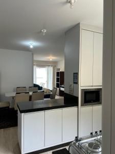 Η κουζίνα ή μικρή κουζίνα στο Apartamento proximo ao mar