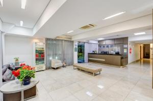 A cozinha ou cozinha compacta de BH Jaraguá Hotel
