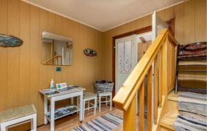 a small room with a table and a staircase at Gorgeous Home In Ravna Gora With Wifi in Ravna Gora +20 photos