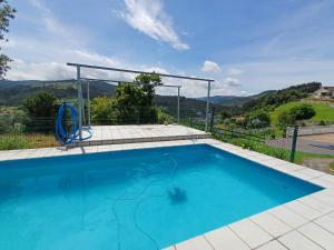 Swimmingpoolen hos eller tæt på Vivienda vacacional De La Prida