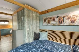 Postel nebo postele na pokoji v ubytování Tiny House