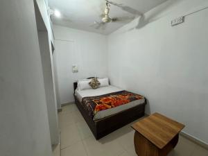 Ένα ή περισσότερα κρεβάτια σε δωμάτιο στο Hotel Darsh Safari - Fort View