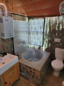 a bathroom with a toilet and a sink at Fisheagle Hut in Orania in Orania