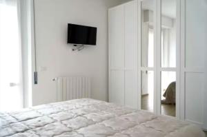 Postel nebo postele na pokoji v ubytování Casa Topazio - 500mt dalla spiaggia