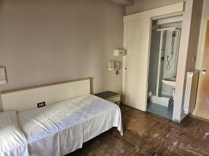 Letto o letti in una camera di Hotel Europa