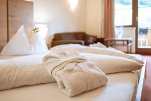 Postel nebo postele na pokoji v ubytování Hotel Bachschmied