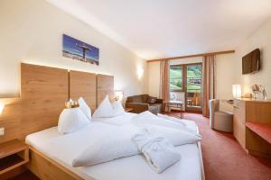 Postel nebo postele na pokoji v ubytování Hotel Bachschmied