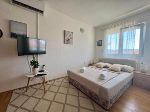 Postel nebo postele na pokoji v ubytování Apartment Rest Mostar Zalik