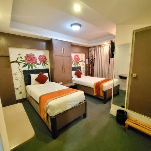 Rúm í herbergi á Hotel Kathmandu square