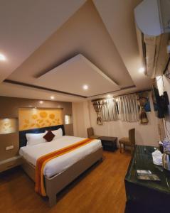 Rúm í herbergi á Hotel Kathmandu square
