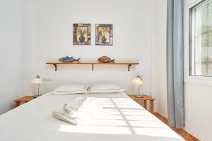 Postel nebo postele na pokoji v ubytování Villa Amapola + 27 fotografií