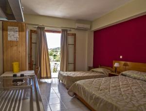 Postel nebo postele na pokoji v ubytování Sea Breeze Apartments