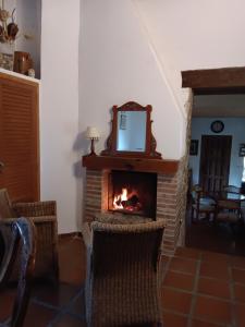 Posezení v ubytování Casa Rural Terapéutica EL CAROCHE