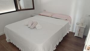 Posteľ alebo postele v izbe v ubytovaní Apartamento en primera línea Javea