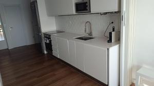 Kuchyňa alebo kuchynka v ubytovaní Apartamento en primera línea Javea