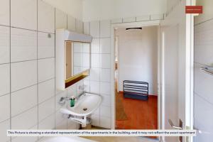 Koupelna v ubytování Easy Living in This 2BR Zurich Apartment