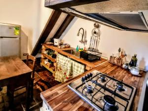 Kuchyň nebo kuchyňský kout v ubytování Antico Gabio holiday home