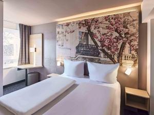 Voodi või voodid majutusasutuse B&B Hotel Bonn-City toas