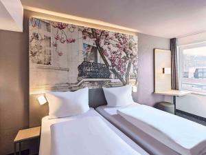 Voodi või voodid majutusasutuse B&B Hotel Bonn-City toas