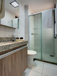 Phòng tắm tại Luxo Beach Park-MANDARA-4 Quartos AR/TV-"Pé na Areia" By HousingCeara