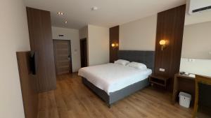 Ліжко або ліжка в номері Hotel Semitronix