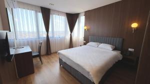 Ліжко або ліжка в номері Hotel Semitronix