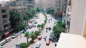 an aerial view of a busy city street with cars at Premium Swiss Residence Agouza in Cairo