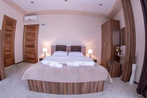 Ліжко або ліжка в номері Hotel Semitronix