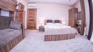 Ліжко або ліжка в номері Hotel Semitronix