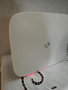 a white laptop computer sitting on top of a table at Da Francesca in Scardovari