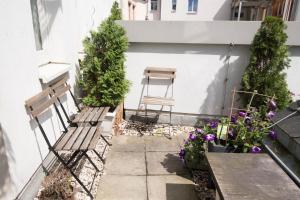 En terrasse eller udendørsområde på Altstadt Suite