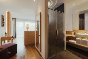 Postel nebo postele na pokoji v ubytování Waldrast - Forestside Living