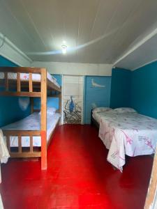 Voodi või voodid majutusasutuse Wira Pora Hostal toas