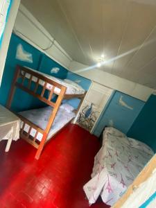 Voodi või voodid majutusasutuse Wira Pora Hostal toas