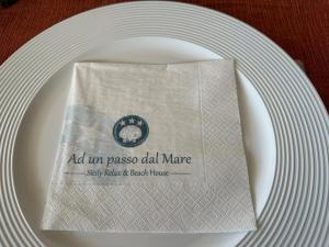 Certificato, attestato, insegna o altro documento esposto da Ad un passo dal mare