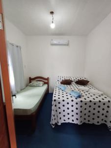 Ένα ή περισσότερα κρεβάτια σε δωμάτιο στο Casa Beira Mar - Boipeba