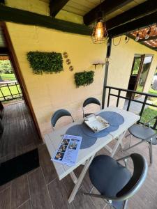 Galería fotográfica de Hospedaje Curiquindi - Mindo Eco Lodge en Mindo