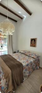 Ένα ή περισσότερα κρεβάτια σε δωμάτιο στο Thai Style House 3 Suites Swimming Pool and Hydro