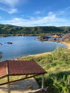 a view of a body of water with a beach at Rancho Velho Chico in Canindé de São Francisco